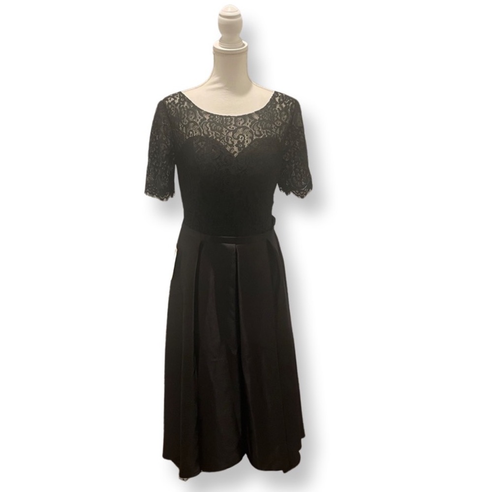 Woman’s lace appliqué formal evening gown A-line satin with pockets.